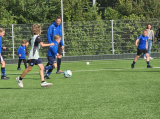 Laatste training S.K.N.W.K. JO10-1 (partijtje tegen de ouders) van woensdag 22 mei 2024 (60/133)